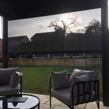 Load image into Gallery viewer, These blinds are purpose fir for our pergolas. For all sizes. These pergola sides can be used to keep out the sun or, in the evening it can be used as a projector screen. During summer evenings the blinds are perfect for displaying a screen from a projector. These blinds are perfect all year round. They can be used as shade next to a hot tub or garden furniture. Order our perfectly fir pergola sides now at Cotswold Garden Shade.
